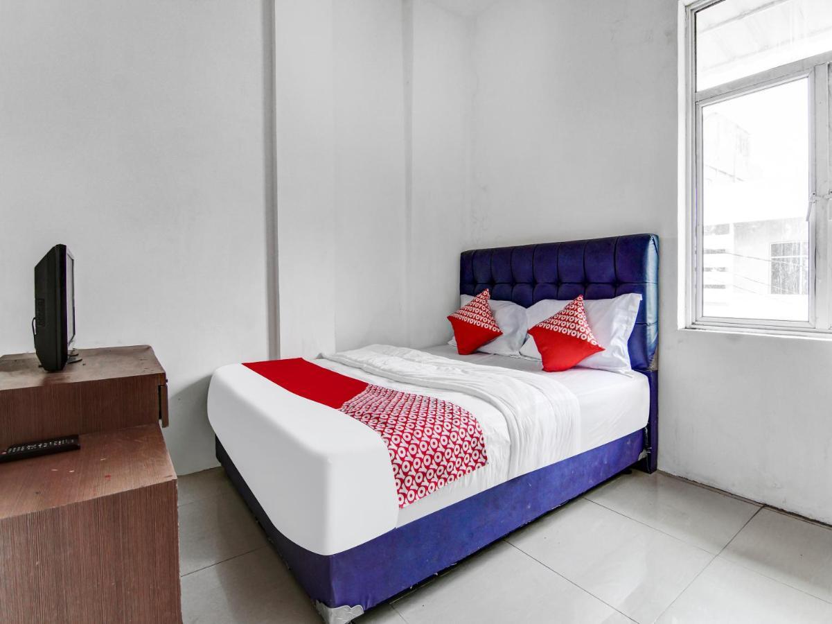 Oyo 90897 Hotel Sepupu Satria Pekanbaru Buitenkant foto