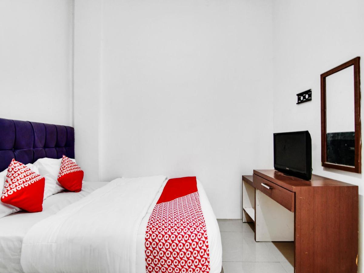 Oyo 90897 Hotel Sepupu Satria Pekanbaru Buitenkant foto